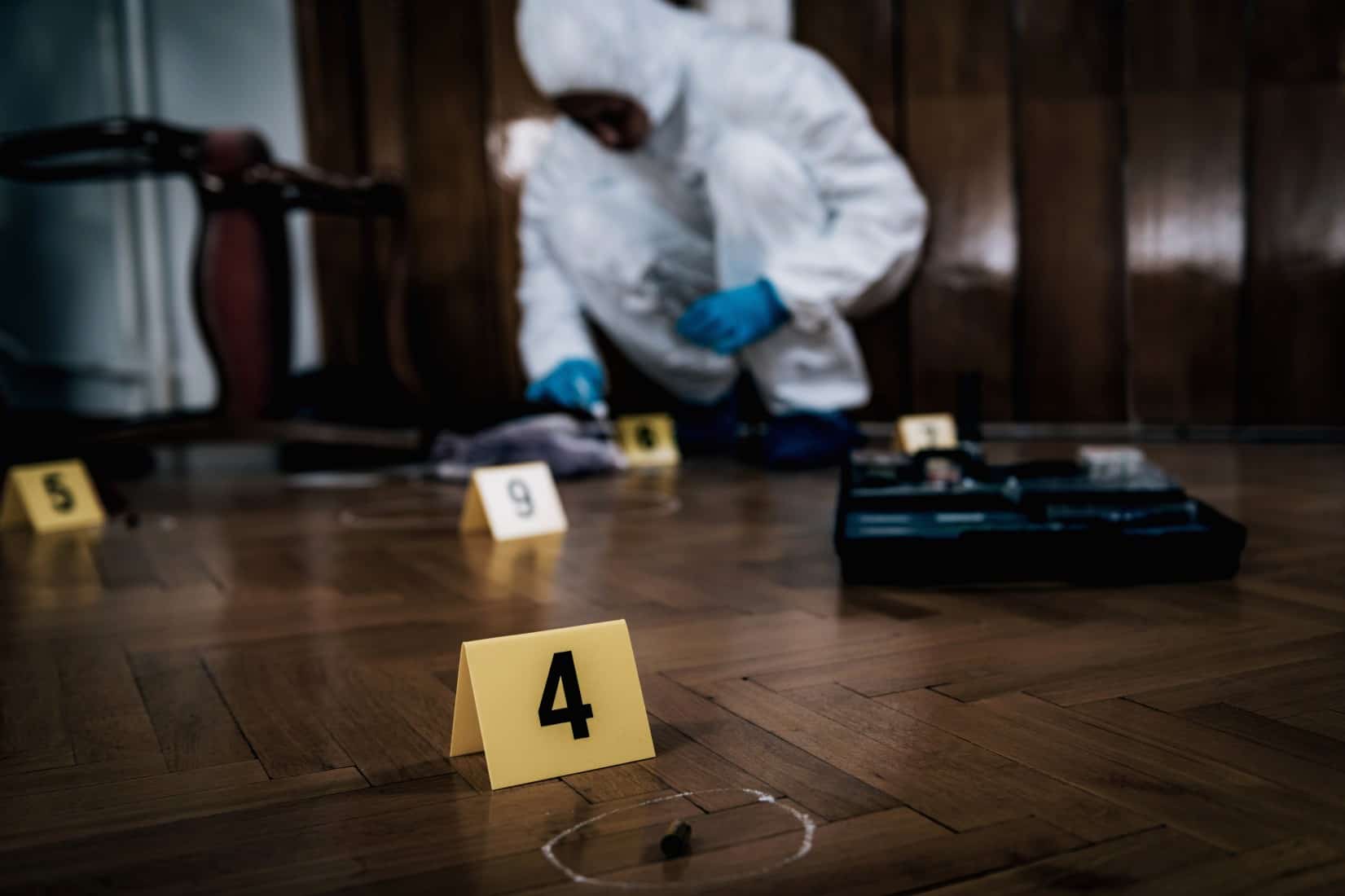 forensic-expert-searching-for-clues